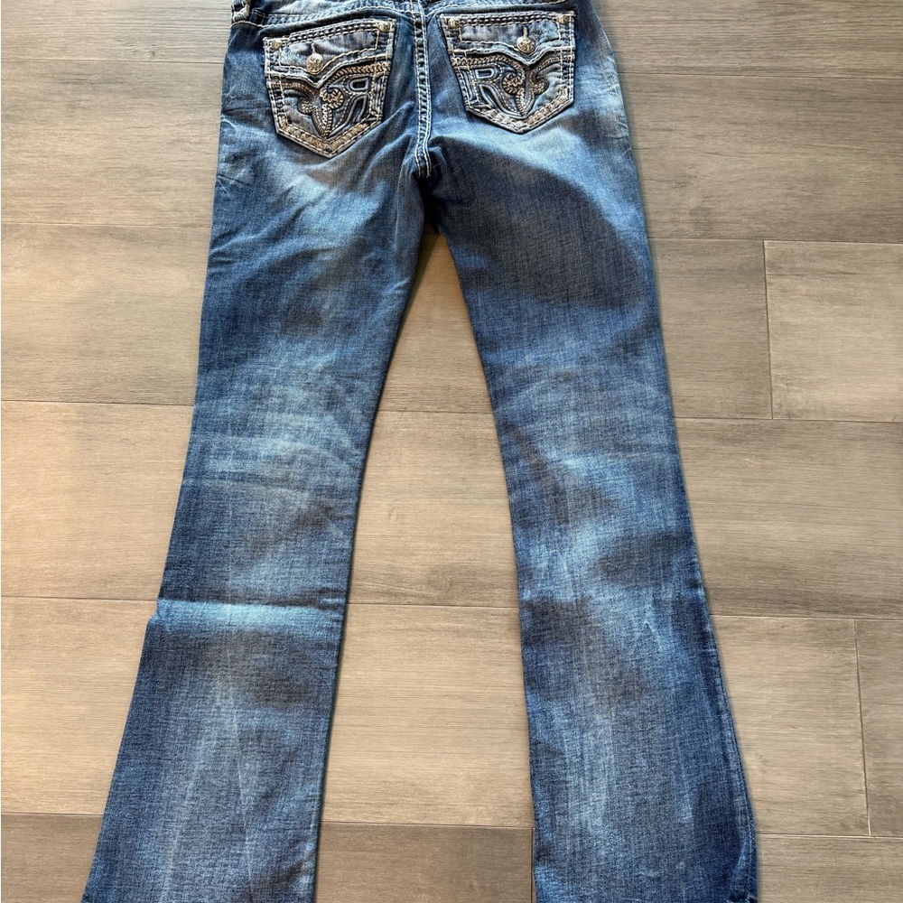 Rock Revival Blue Embroidered Back Pocket Bootcut Jeans “Sundee” Mid Rise